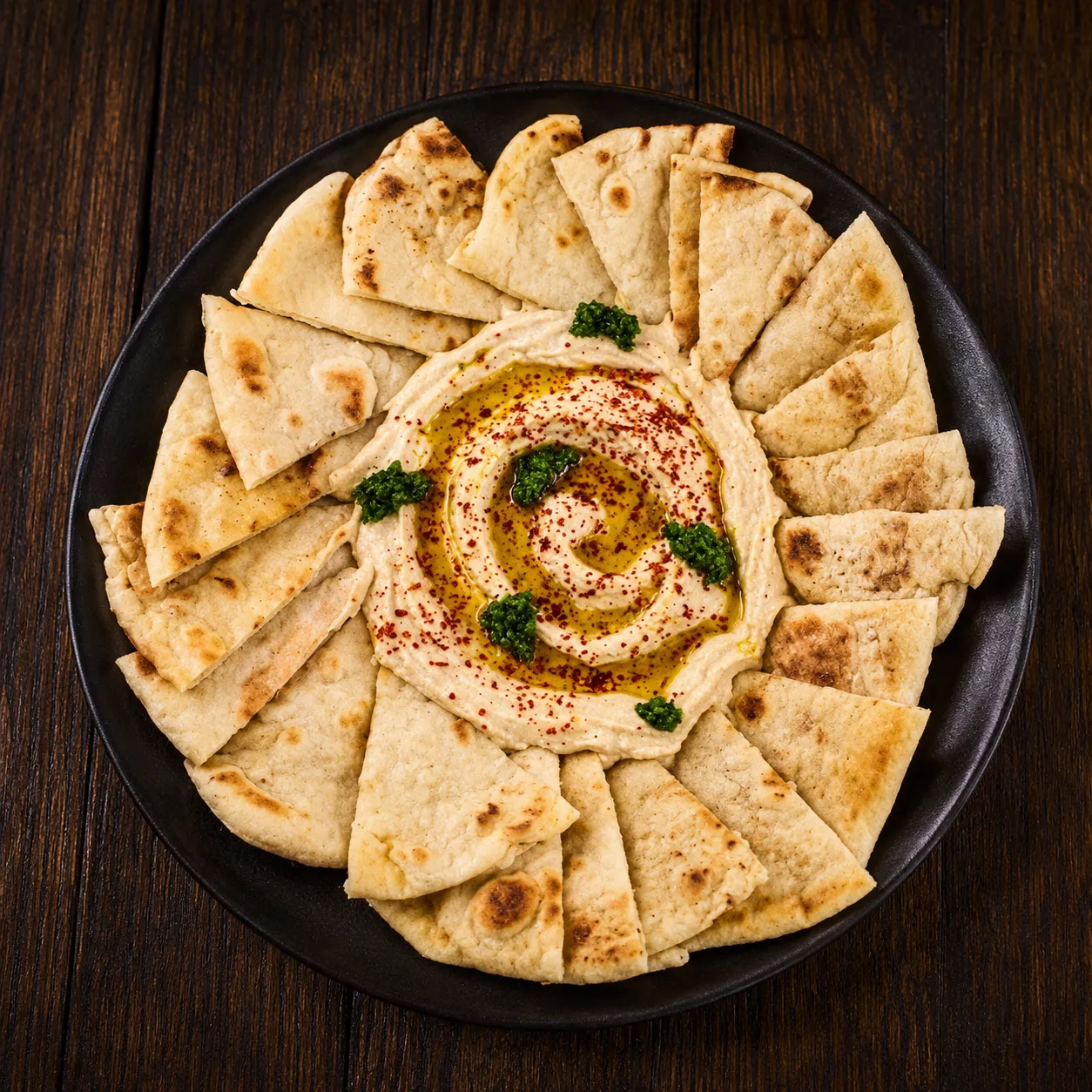 House-made hummus with warm pita bread at Dooly's Shawarma & Falafel, London Ontario